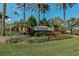 Islandwalk community entrance with lush landscaping and signage at 13510 Esposito St, Venice, FL 34293