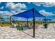 Community garden with seating and shade at 13510 Esposito St, Venice, FL 34293
