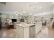 Spacious kitchen with an island, stainless steel appliances, and views to Gathering room at 13510 Esposito St, Venice, FL 34293