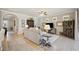 Spacious living room with neutral color palette and comfortable seating at 13510 Esposito St, Venice, FL 34293