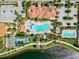 Resort-style pool, lap pool, bocce ball, and parking from above at 13510 Esposito St, Venice, FL 34293