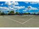 Enjoy well-lit tennis courts under a sunny sky at 13510 Esposito St, Venice, FL 34293