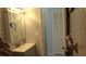 Bathroom with vanity, medicine cabinet and linen closet at 1739 Bonitas Cir # 1724C, Venice, FL 34293