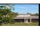 View of community featuring building exteriors and landscaping at 1739 Bonitas Cir # 1724C, Venice, FL 34293