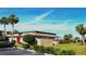 Building exterior with red door and landscaping at 1739 Bonitas Cir # 1724C, Venice, FL 34293