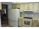 Bright kitchen features updated appliances and ample cabinet space at 1739 Bonitas Cir # 1724C, Venice, FL 34293