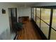 Relaxing screened porch with patio furniture at 1739 Bonitas Cir # 1724C, Venice, FL 34293