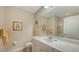 Guest bathroom with white vanity and toilet at 21042 Anclote Ct, Venice, FL 34293