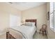 Cozy bedroom with a queen bed and ample closet space at 21208 Sandal Foot Dr, Venice, FL 34293