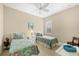 Twin bedroom with two beds and plenty of natural light at 21208 Sandal Foot Dr, Venice, FL 34293