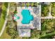 Community pool with surrounding lounge chairs and patio at 21208 Sandal Foot Dr, Venice, FL 34293