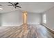 Bright and airy living room boasting gorgeous flooring and an open layout, perfect for entertaining at 215 Portia N St, Nokomis, FL 34275