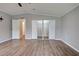 Spacious main bedroom includes ensuite bath, double closets and wood-look floors at 215 Portia N St, Nokomis, FL 34275