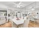 Dining area with white table and chairs, and hardwood flooring at 4160 Fruitville Rd # 14, Sarasota, FL 34232