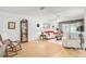 Spacious living room with hardwood floors and ample seating at 4160 Fruitville Rd # 14, Sarasota, FL 34232