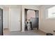 Small bedroom with gray laminate flooring and closet at 4666 La Rosa Ave, North Port, FL 34286