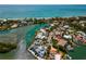 Aerial view of waterfront homes with access to the Gulf and private boat docks along canals at 922 Casey Cove Dr, Nokomis, FL 34275