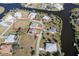 Vacant lot with canal views and nearby houses at 9401 President Cir, Port Charlotte, FL 33981