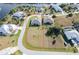 Aerial view of a vacant lot next to a house at 9401 President Cir, Port Charlotte, FL 33981