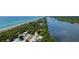 Aerial view of beach, mangrove, and calm waters at 9401 President Cir, Port Charlotte, FL 33981