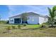 Charming home with a screened lanai and spacious backyard at 9401 President Cir, Port Charlotte, FL 33981