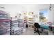 Bright office or craft room with shelving and work station at 9401 President Cir, Port Charlotte, FL 33981
