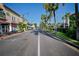 Scenic street view showing shops and palm trees at 9401 President Cir, Port Charlotte, FL 33981