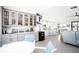 Home features a wet bar with seating and storage at 9401 President Cir, Port Charlotte, FL 33981