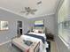 Main bedroom with stylish decor and ensuite bath at 9847 Haze Dr, Venice, FL 34292