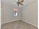 Charming bedroom with tile floors and window at 9847 Haze Dr, Venice, FL 34292