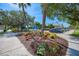 Entrance to Centennial Park, featuring beautiful landscaping and ample parking at 9847 Haze Dr, Venice, FL 34292