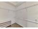 Large walk-in closet with shelving and rods at 9847 Haze Dr, Venice, FL 34292