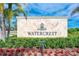 Watercrest community entrance sign with landscaping at 9847 Haze Dr, Venice, FL 34292