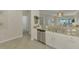 Modern kitchen with stainless steel appliances and granite countertops at 9847 Haze Dr, Venice, FL 34292