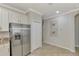 Modern kitchen with stainless steel appliances and granite countertops at 9847 Haze Dr, Venice, FL 34292