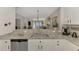 Modern kitchen with stainless steel appliances and granite countertops at 9855 Haze Dr, Venice, FL 34292