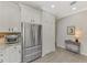 Modern kitchen with stainless steel appliances and granite countertops at 9855 Haze Dr, Venice, FL 34292