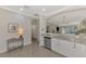 Modern kitchen with stainless steel appliances and granite countertops at 9855 Haze Dr, Venice, FL 34292