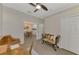 Spacious office with built-in desk and view into dining area at 9855 Haze Dr, Venice, FL 34292