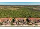 Aerial view of a single unit with attached garage in a community setting at 10055 Crooked Creek Dr # 102, Venice, FL 34293