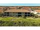 Aerial view of a single unit with private backyard, located in a community at 10055 Crooked Creek Dr # 102, Venice, FL 34293