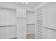 Large walk-in closet with ample shelving and drawers at 10055 Crooked Creek Dr # 102, Venice, FL 34293
