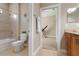 Clean bathroom with tile flooring, bathtub, and toilet at 115 Avalini Way, North Venice, FL 34275