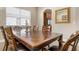 Elegant dining room showcasing a detailed wooden table at 115 Avalini Way, North Venice, FL 34275