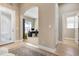 Spacious entryway with views into an office or sitting area at 115 Avalini Way, North Venice, FL 34275