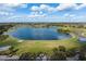 Golf course with lake view at 115 Avalini Way, North Venice, FL 34275