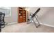 Home gym with inversion table and exercise bike at 115 Avalini Way, North Venice, FL 34275