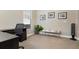 Charming home office features a desk, window, and decorative bench at 115 Avalini Way, North Venice, FL 34275