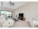 Living room with recessed lighting, comfortable seating and a view to the outdoors at 115 Avalini Way, North Venice, FL 34275