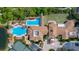 Resort-style pool area with tennis courts at 115 Avalini Way, North Venice, FL 34275